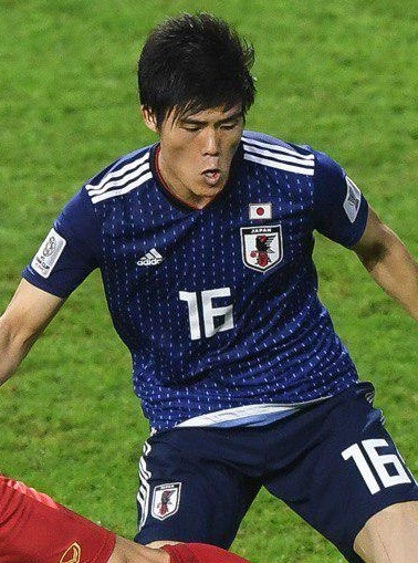 T. Tomiyasu